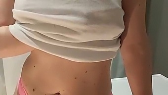 A Blonde Woman Masturbates In A Bathroom And Ejaculates
